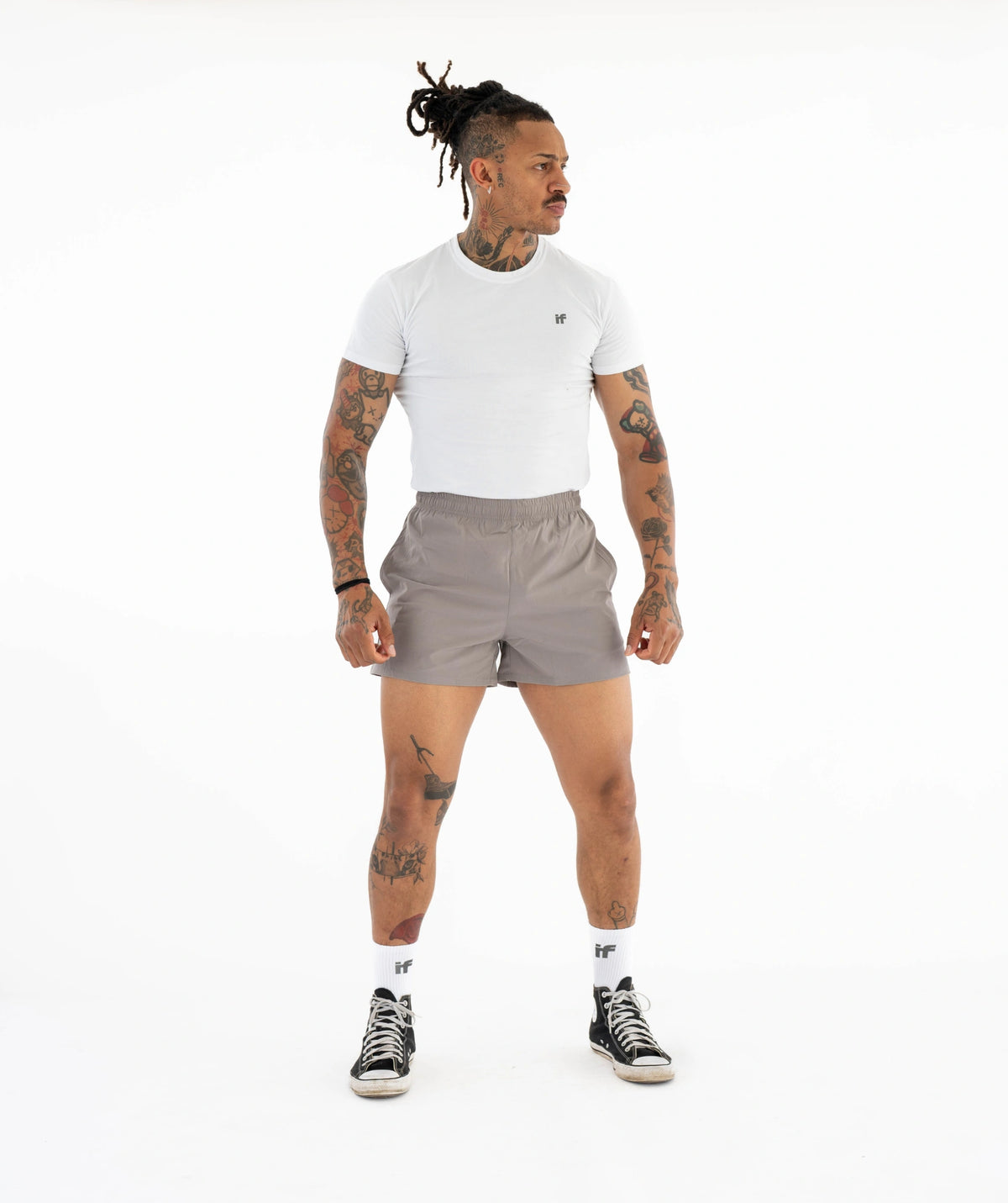 white t-shirt beige shorts
