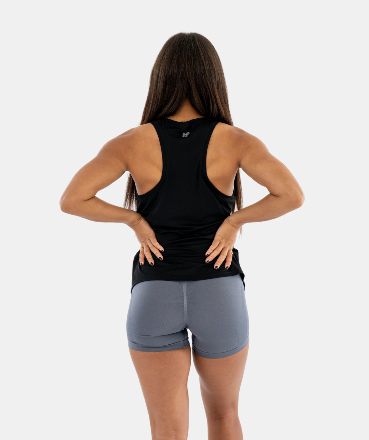black tank top and gray shorts