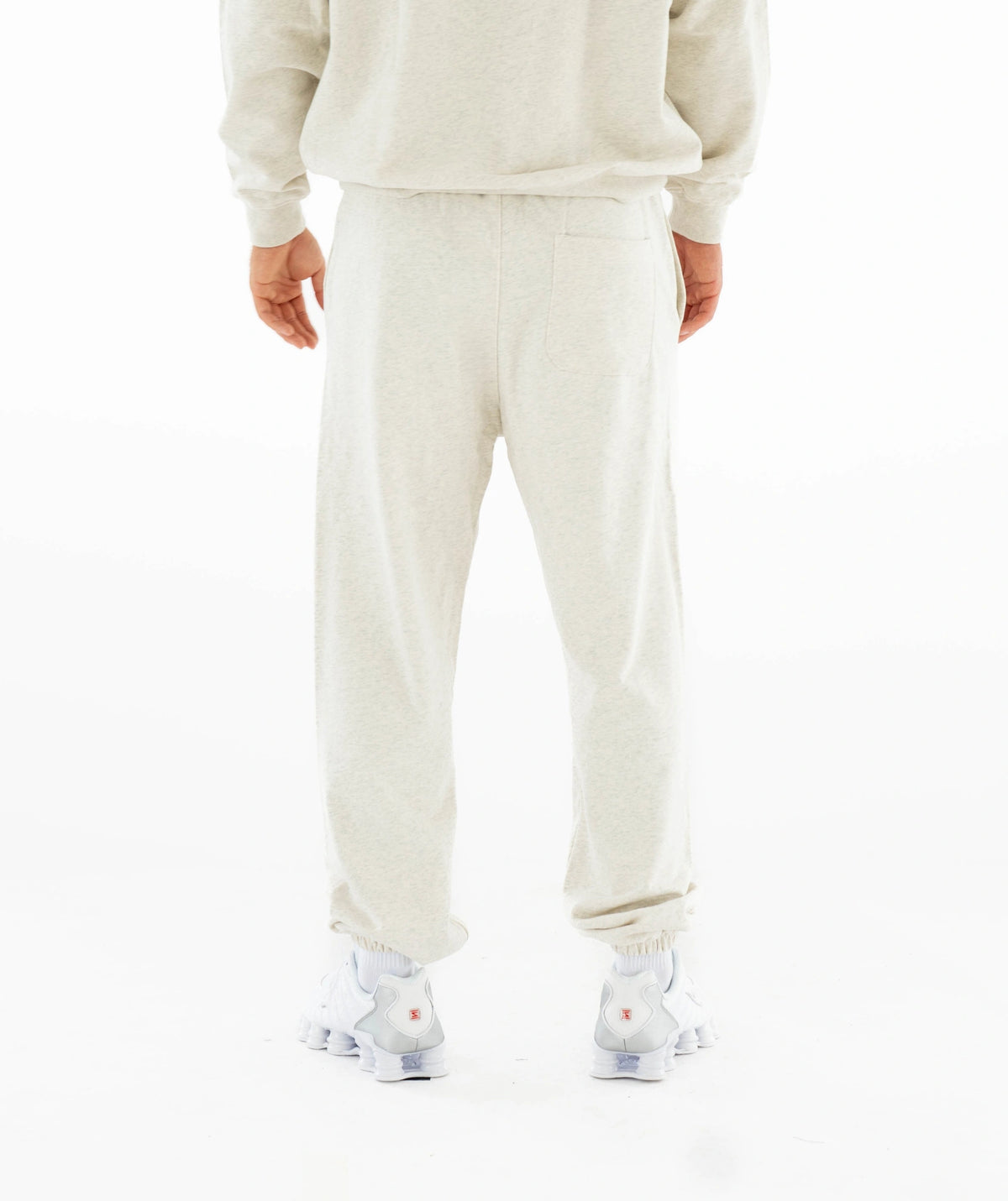 cream-colored tracksuit 