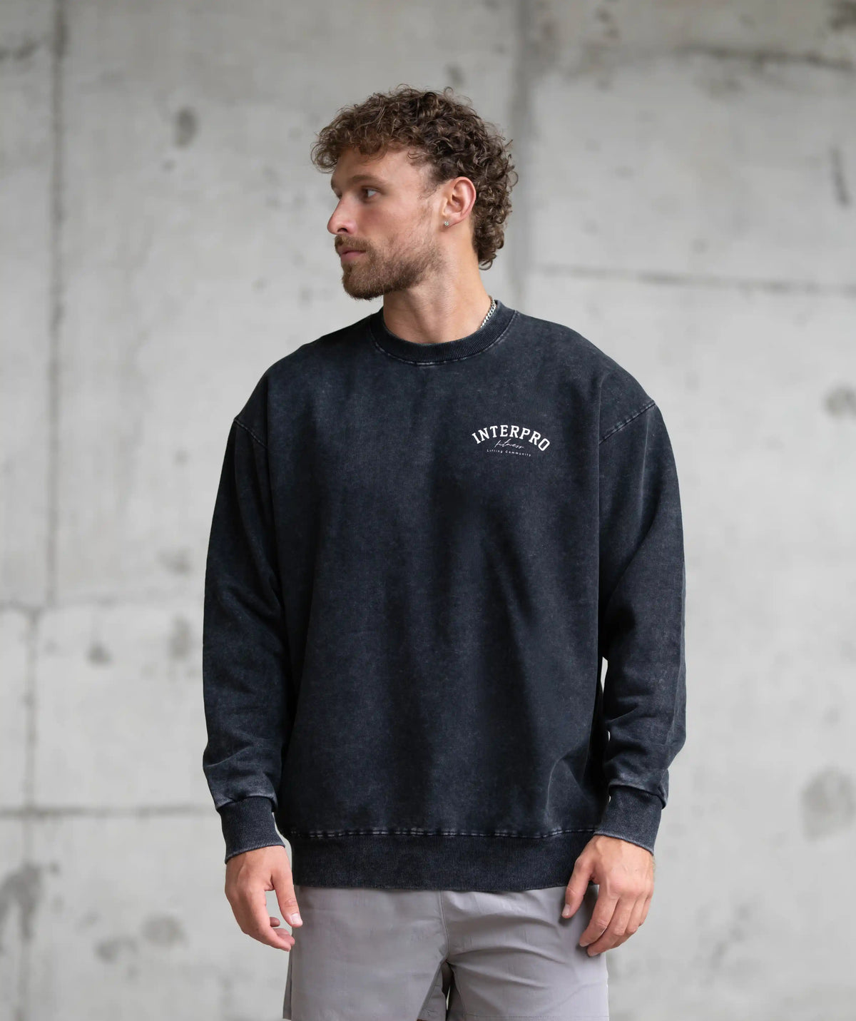 Man wearing a dark blue sweatshirt 