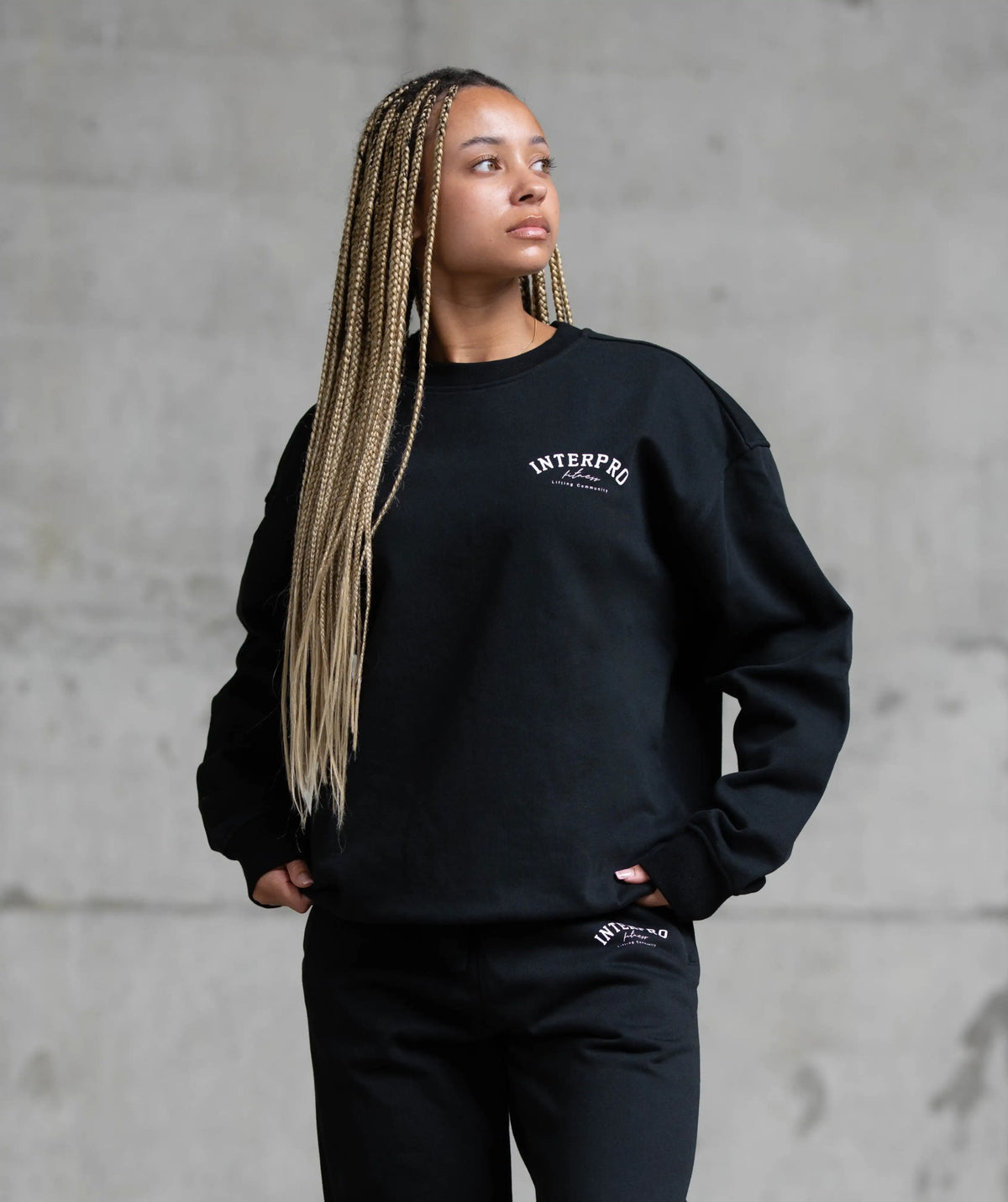 black sweatshirt with a logo