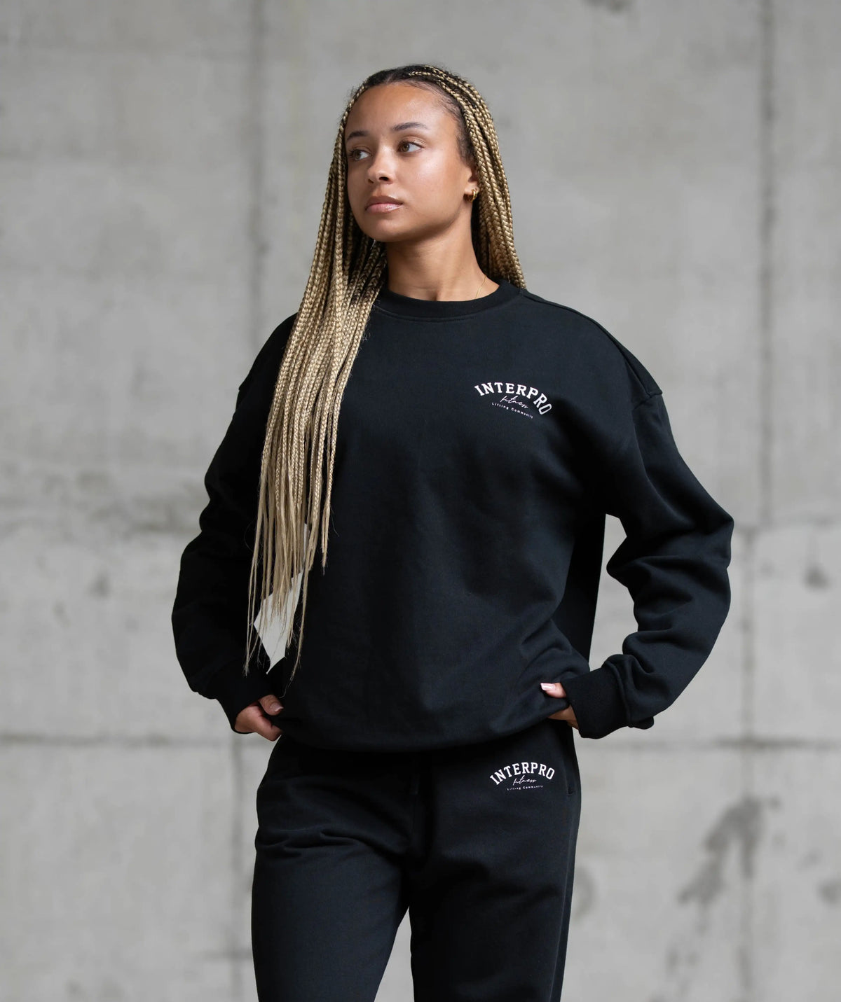 black sweatshirt with 'Interpro' 
